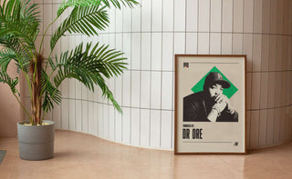 Dr. Dre museum-quality poster on matte paper displayed unframed against a white tiled wall.