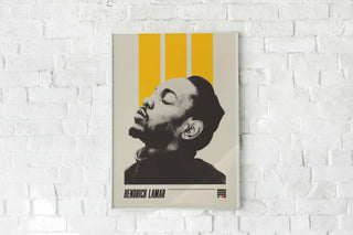 Kendrick Lamar poster on white brick wall, featuring striking design with bold colors, museum-quality matte paper.