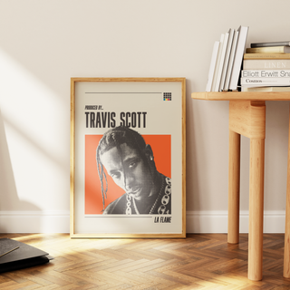 Travis Scott museum-quality poster with black and white halftone imagery and colored background, framed and displayed in a room.