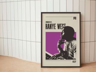 Kanye West poster in frame on matte paper with purple background, music theme.