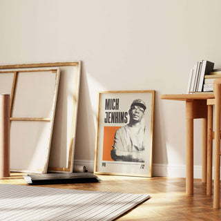 Mick Jenkins poster on matte paper, framed and leaning against a wall in a stylish room setting.