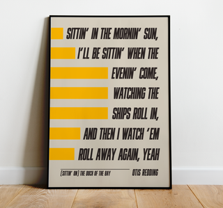 Otis Redding "Sittin' on the Dock of the Bay" lyrics poster on a matte paper background.