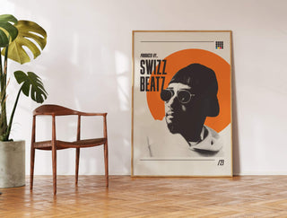 Museum-quality Swizz Beatz poster with vibrant orange circle and stylish design displayed in a modern interior.